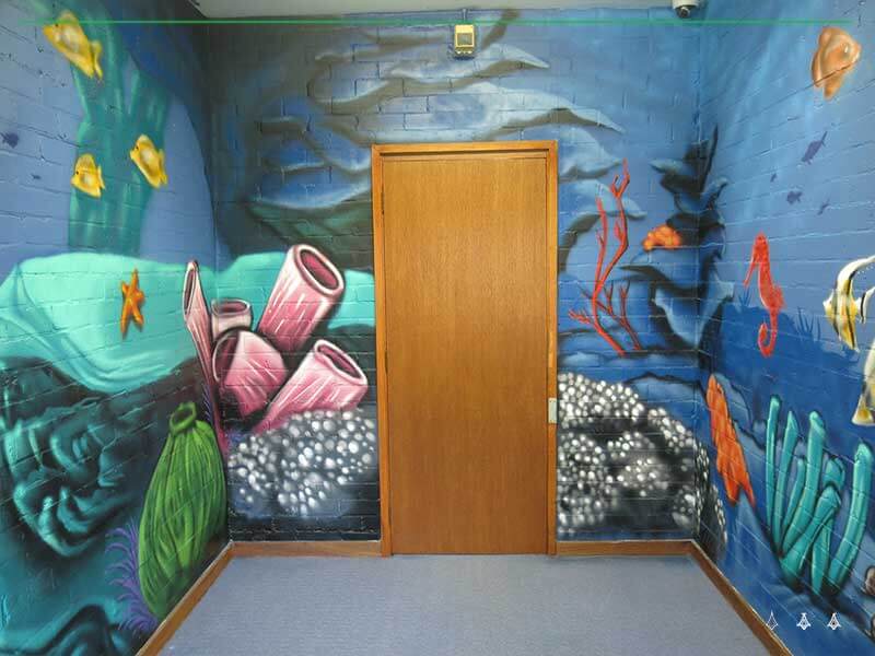 Underwater scene painted as an immersive room for a school in Western Sydney