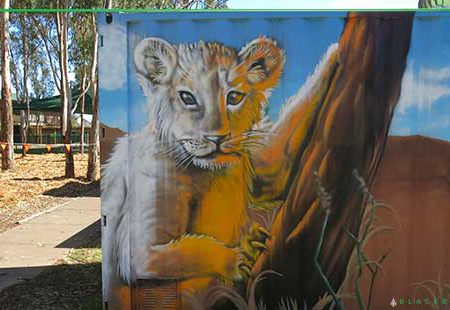 Shipping container painted mural for a school