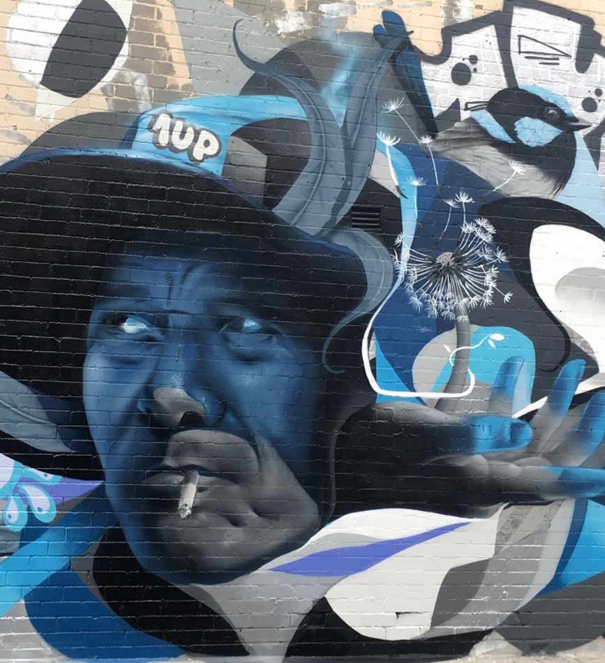 Graffiti portrait painted by Dcydes