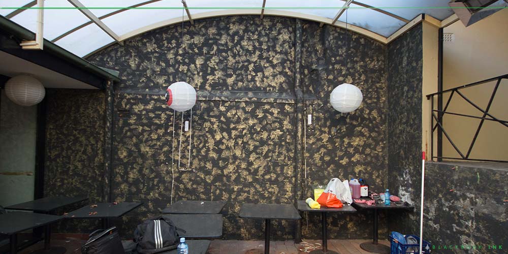 Hospitality mural before being painted by Blackbook Ink