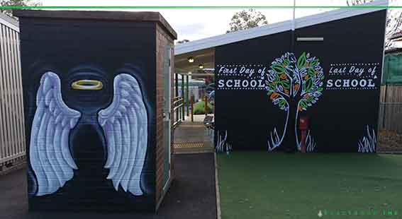 an experience mural of angel wings painted at Birrong Public School