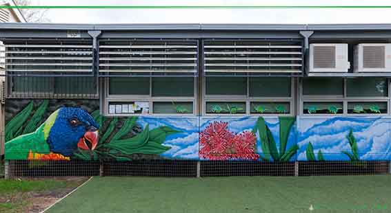 demountable mural of lorikeet painted at Birrong Public School