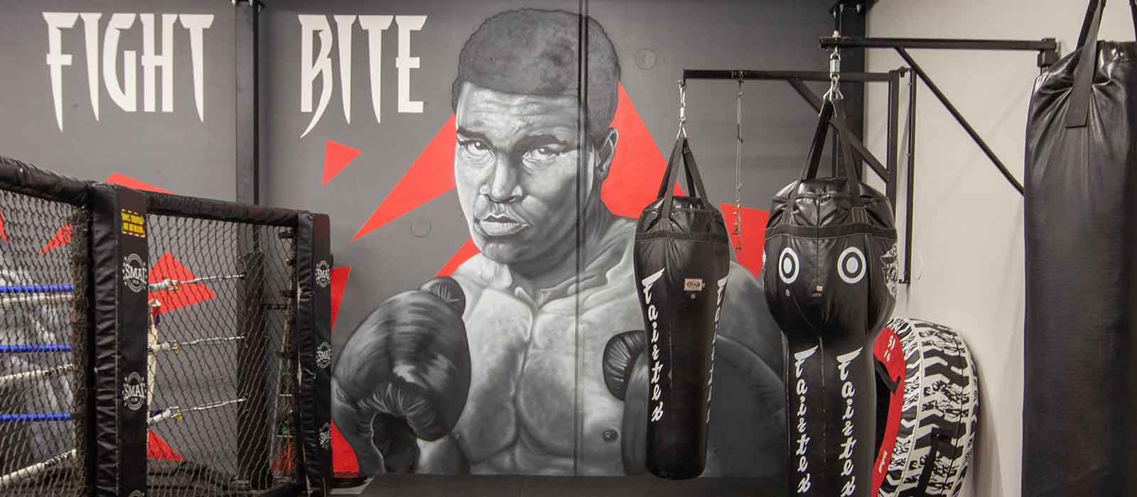 Graffiti portrait of Ali painted by one of our hired graffiti artists