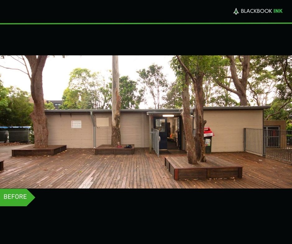 Before photo of a blank surface before the school mural was painted.