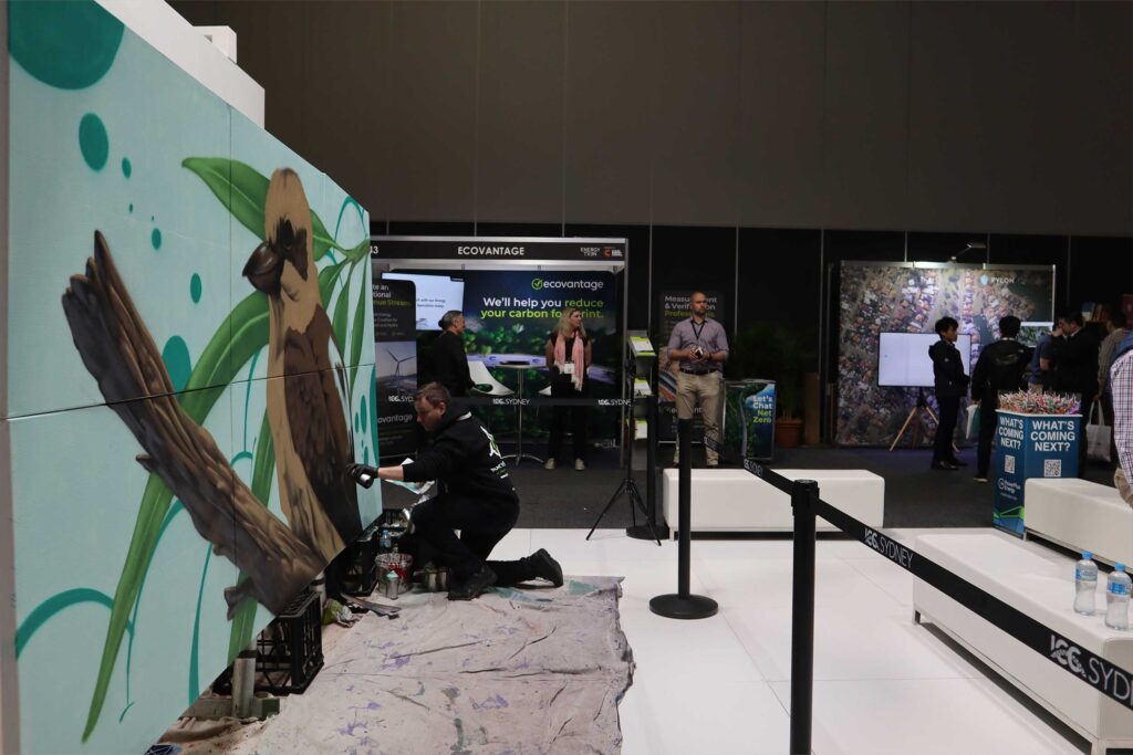 Mural process in action painting live at the Sydney International Convention Centre
