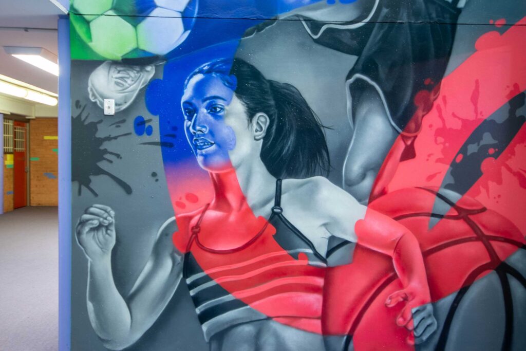 Ambarvale-High-Mural-7 sports based mural of girl running