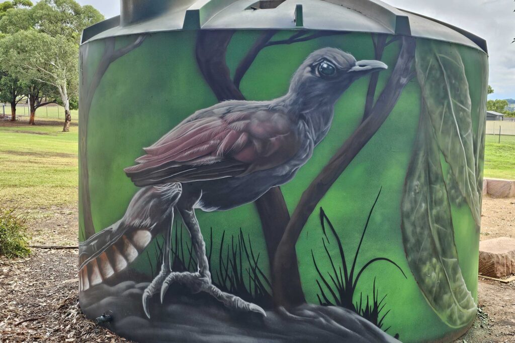 Thomas-Acres-Ps-Native-Mural-12 Lyrebird mural painted on Water tank in Sydney School