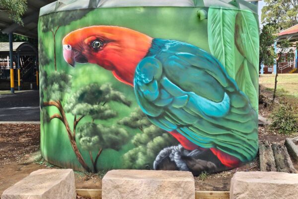 Bird mural on a watertank in a Sydney School