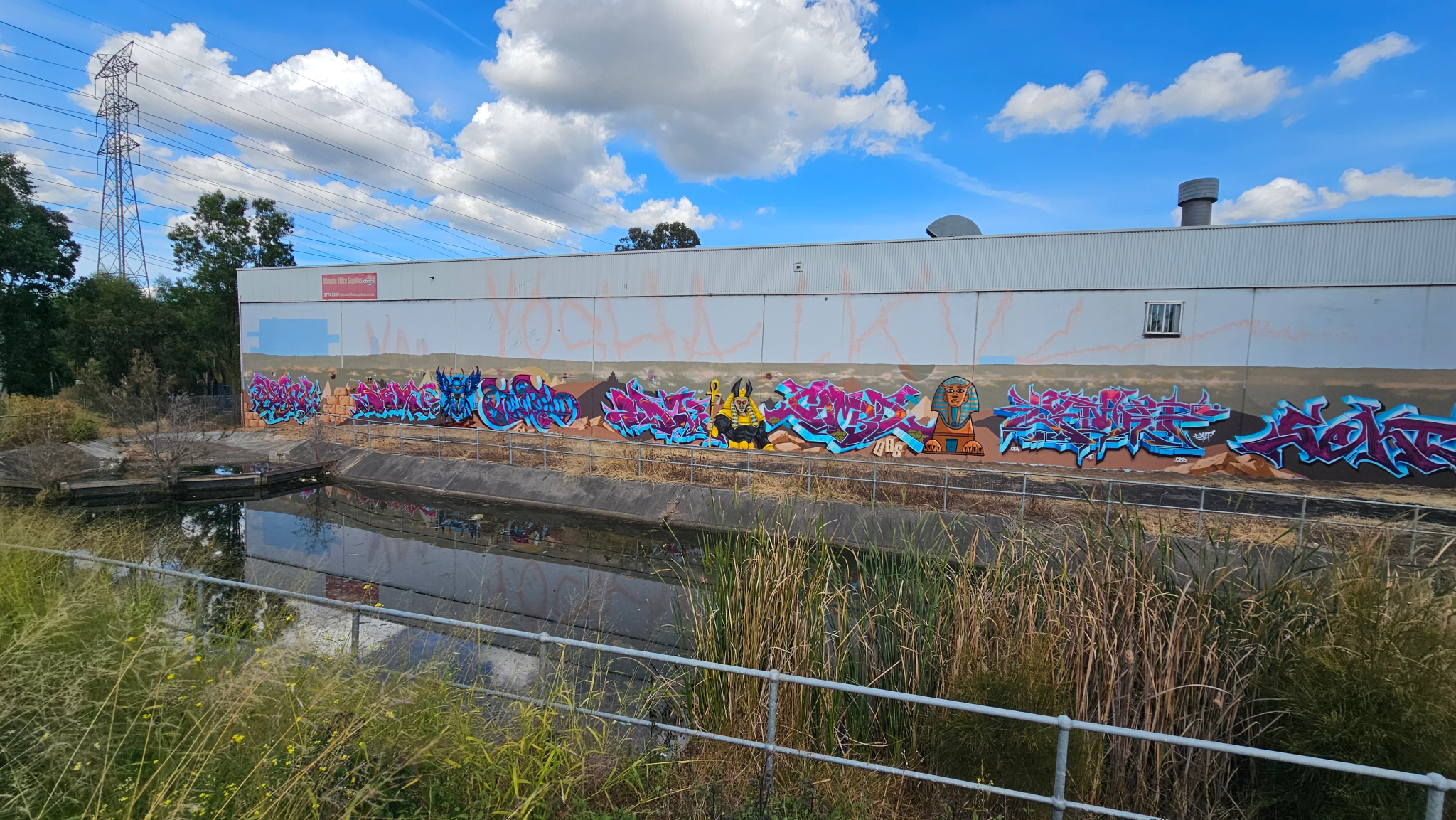 M5 motorway graffiti mural project painted by Blackbook Ink