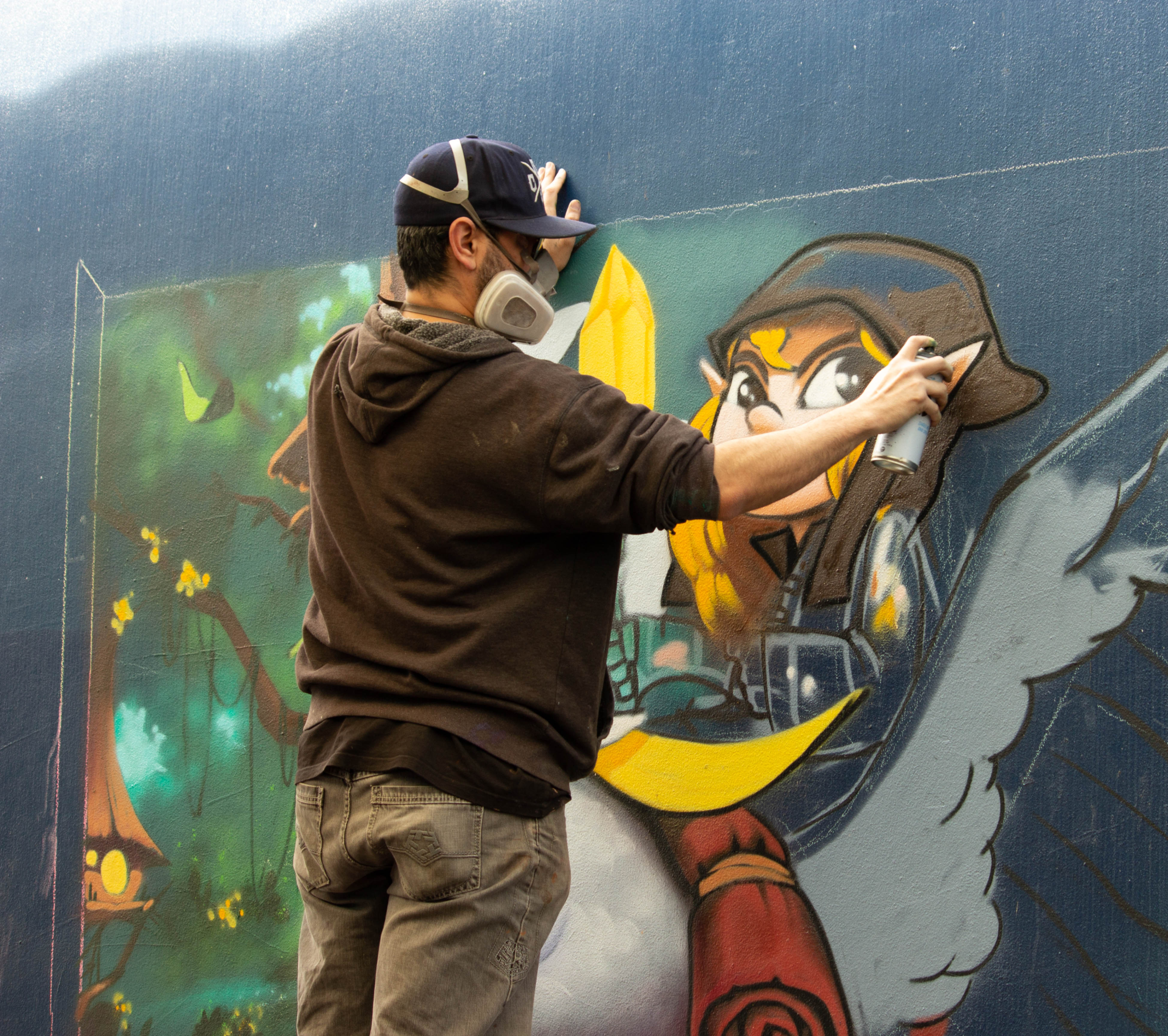 Peque - Sydney graffiti artist, painting at the alleyway gallery in Bankstown